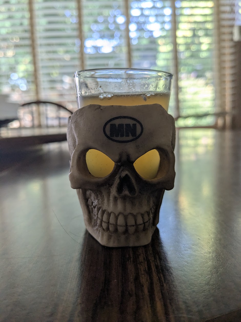 tepache in a skull shot glass